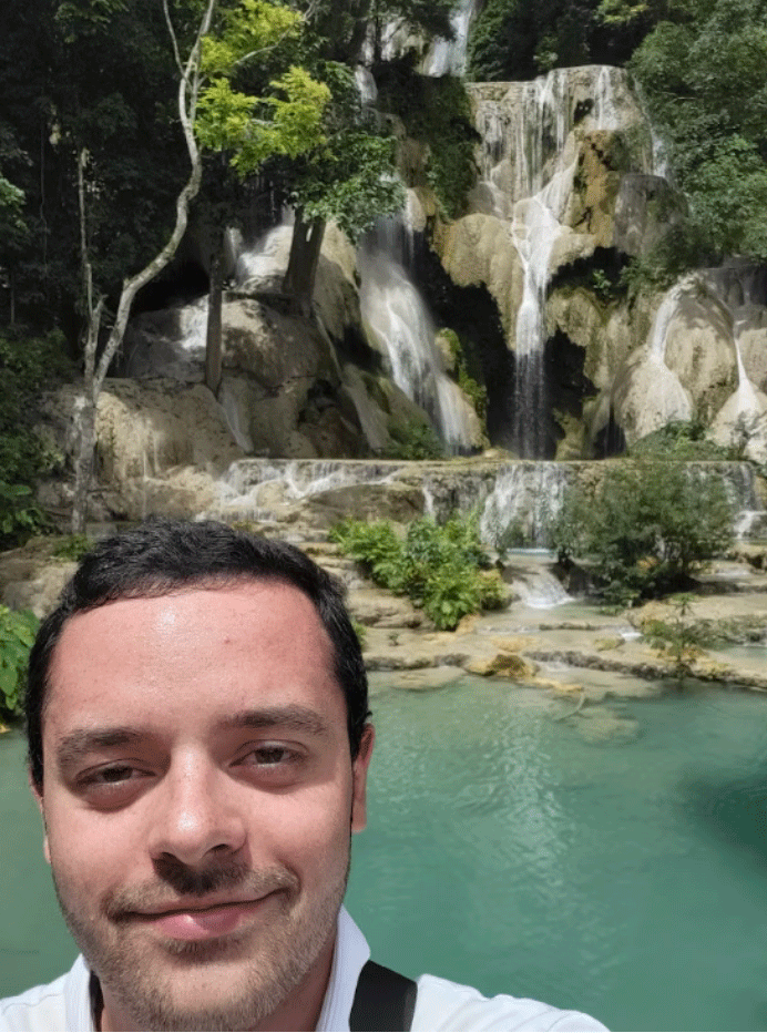 1-1-Lucas-at-the-Kuang-Si-Waterfalls,-Luang-Prabang,-Laos