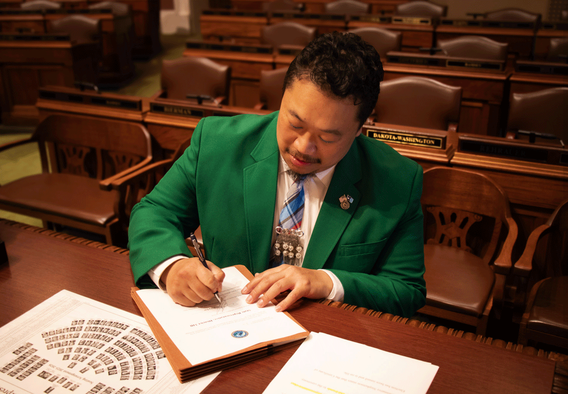 2-1-XP-Lee-signing-document